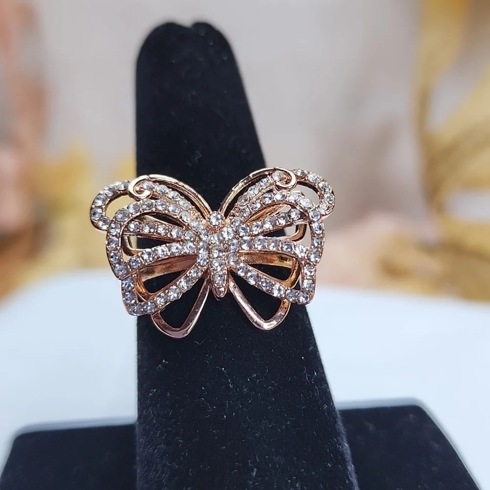 BUTTERFLY ROSR GOLD TONED RING
